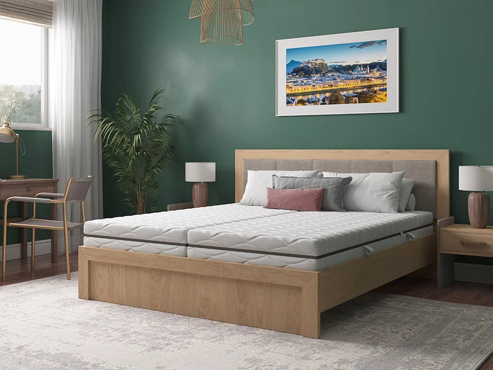 Elastica Boxspringbett mit Holzgestell in grün gestaltetem Schlafzimmer