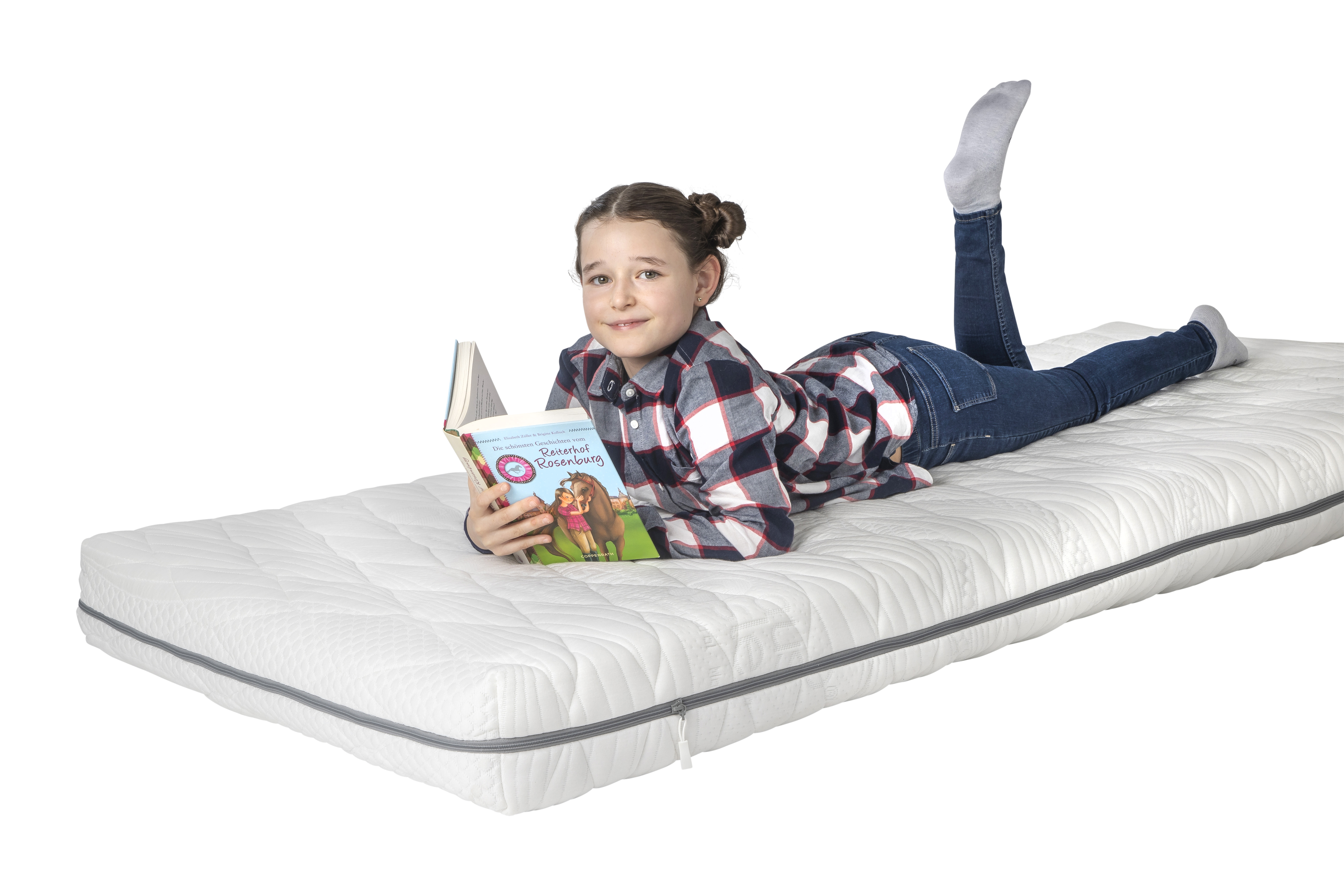 Kind auf Elastica Star Matratze